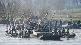NATO descending into ‘wartime ecstasy’ – Kremlin