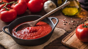 African woman jailed over tomato sauce review