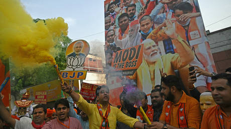 Supporters of Narendra Modi, India's Prime Minister and leader of Bharatiya Janata Party (BJP) celebrate vote counting results for India's general election, at BJP headquarters in New Delhi on June 4, 2024.