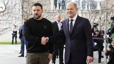 Olaf Scholz (R) shakes hands with Vladimir Zelensky during a visit by the latter to Berlin, Germany, February 16, 2024