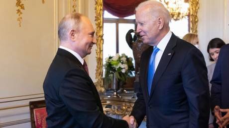US and Russian Presidents Joe Biden and Vladimir Putin shake hands during their Geneva summit in June 2021.
