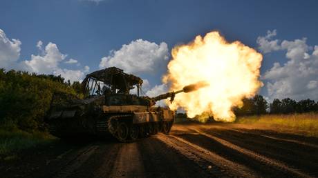 FILE PHOTO. A Russian tank seen firing in Lugansk People's Republic, Russia.