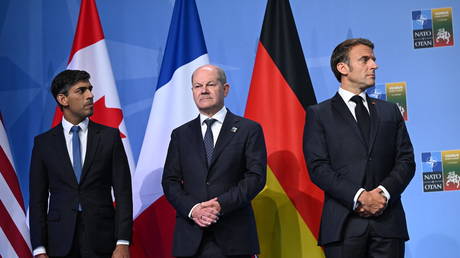 FILE PHOTO: Britain's Prime Minister Rishi Sunak, German Chancellor Olaf Scholz and French President Emmanuel Macron attend an event with G7 leaders to announce a Joint Declaration of Support for Ukraine during the NATO Summit in Vilnius on July 12, 2023.