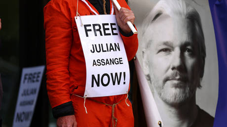 A Julian Assange supporter protests in front of Westminster Magistrates Court, while calling for his release from Belmarsh Prison, on April 14, 2024 in London, England.