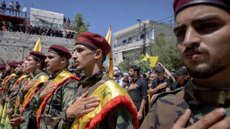 Hezbollah fighters attend funerals of their soldiers on June 29, 2024 in Aita al Chaab, Lebanon