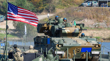 FILE PHOTO. South Korean Army K-30 self-propelled anti-aircraft gun crosses a floating bridge during a South Korea-US joint river-crossing drill in Yeoju.