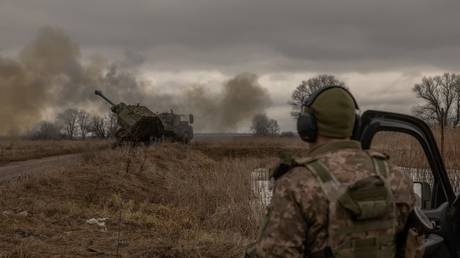 Ukrainian soldiers fire a Swedish-made Archer 155mm howitzer at Russian positions in the Donetsk People's Republic, January 20, 2024