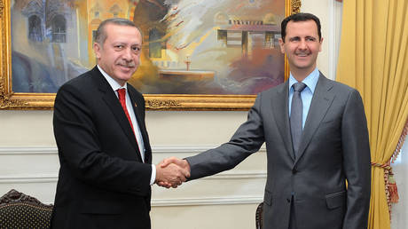 FILE PHOTO: Recep Tayyip Erdogan and Bashar al-Assad.
