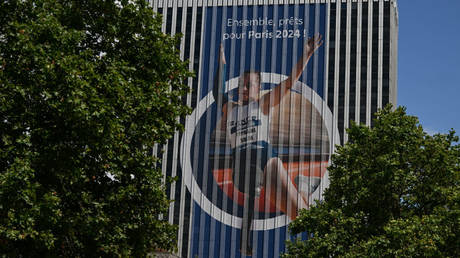 Giant advertisement with Olympic-themed graphics in Paris, France on July 13, 2024