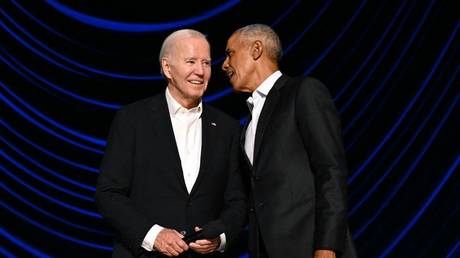 Joe Biden (L) stands with Barack Obama during a campaign fundraiser in Los Angeles, California, June 15, 2024