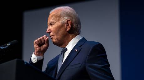 Joe Biden clears his throat as he speaks at the College of Southern Nevada in Las Vegas, Nevada, July 16, 2024