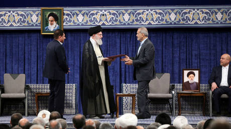 Masoud Pezeshkian receives official endorsement from Iranian Supreme Leader Ayatollah Ali Khamenei in a ceremony in Tehran, Iran, July 28, 2024.