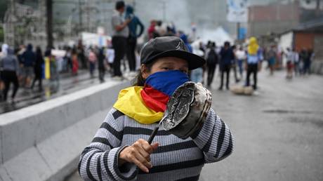 A woman protests against Venezuelan President Nicolas Maduro's government in Caracas on July 29, 2024, the day after the election