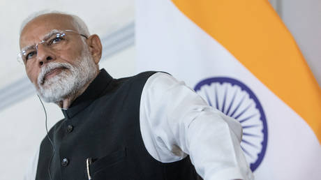 Indian Prime Minister Narendra Modi addresses a press conference with Austria's Chancellor (not pictured) after bilateral talks at the Chancellory in Vienna, on July 10, 2024 during Modi's state visit to Austria.