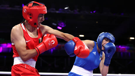 Imane Khelif of Algeria and Angela Carini of Italy during a women's 66kg match at the Olympic Games in Paris, August 1, 2024.