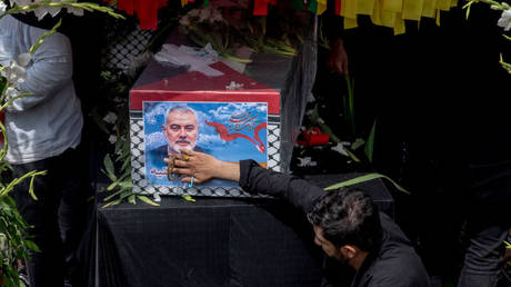 Iranians attend a funeral ceremony held for Hamas political chief Ismail Haniyeh in Tehran, Iran, August 1, 2024.