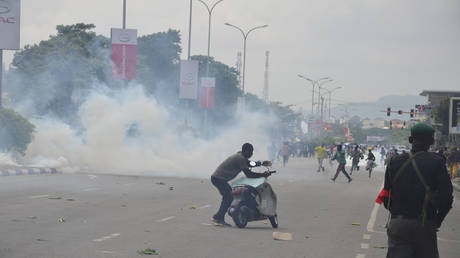 Nigerian leader demands end to violent protests