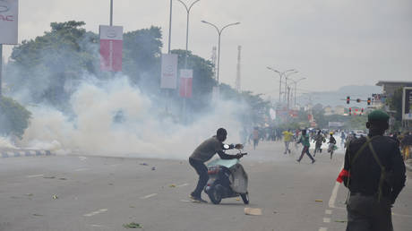 Police fired tear gas during a protest in Abuja, Nigeria, Aug. 1, 2024.