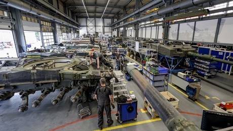 Leopard 2A4 battle tanks are maintained at a Rheinmetall facility in Unterluess, Germany, June 6, 2023