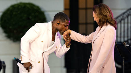 Gospel singer Kirk Franklin and US Vice President Kamala Harris at the White House, Washington, DC, June 10, 2024.