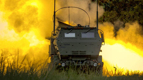 FILE PHOTO: A rocket being launched by a US-made HIMARS system.