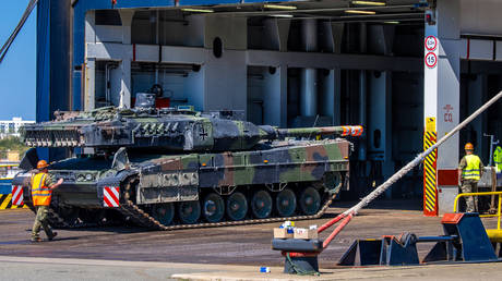 A Leopard 2 tank being loaded onto a ferry, Rostock, Germany, May 3, 2024.