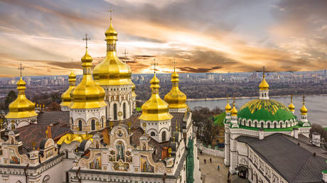 FILE PHOTO: Cupolas of Pechersk Lavra Monastery and river Dniepr panoramic city view, Kiev, Ukraine.