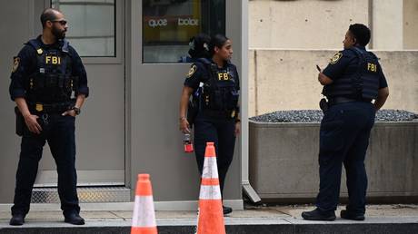 FILE PHOTO: Members of the Federal Bureau of Investigation (FBI) in Washington, DC.