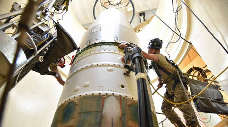 FILE PHOTO: Air Force airmen working on a ballistic missile near Malmstrom Air Force Base in Montana.