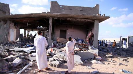 FILE PHOTO: Photo taken on August 9, 2011 during a tour organized by the Libyan government shows the ruins of a house after NATO air raids in Majar, a village south of Zlitan, Libya.