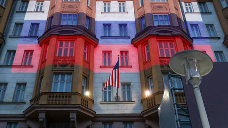 A projection of the Russian flag on the US building during a protest outside the US Embassy.