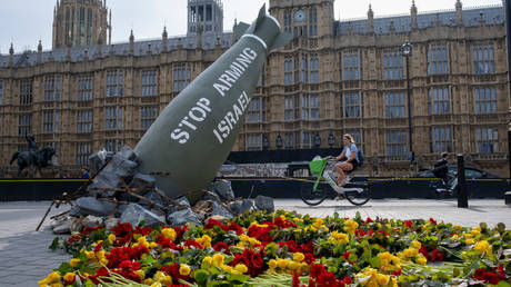 A replica bomb placed by protesters outside the Houses of Parliament in London, England, July 30, 2024