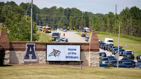 Parents arrive to meet students after a shooting at Apalachee High School on September 4, 2024 in Winder, Georgia.