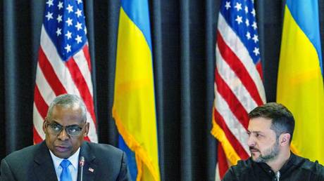 FILE PHOTO: US Defense Secretary Llyod Austin (L) and Ukraine's Vladimir Zelensky take part in a meeting at Ramstein Air Base, Germany, on September 6, 2024.