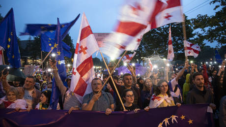 FILE PHOTO: Protesters opposing the bill on 'transparency of foreign influence' gather in the Georgian capital Tbilisi on May 11, 2024