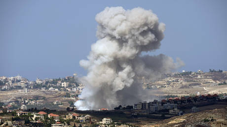 Smoke rising from villages after an Israeli shelling in the Nabatiyeh district, seen from the southern town of Marjayoun, Lebanon, Sept. 23, 2024