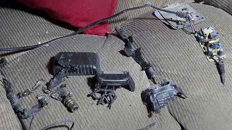 This video grab, shows a walkie-talkie that was exploded inside a house, in Baalbek, east Lebanon, September 18, 2024.