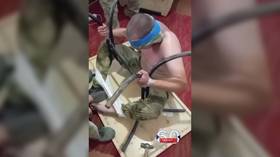 Ukrainian troops filmed torturing Russian soldier (GRAPHIC VIDEO)