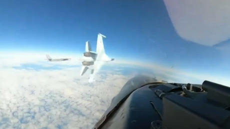 WATCH: Russian Fighter Jet Maneuvers to Divert US F-16 from Nuclear Bomber