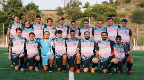 A team photo of Fenix FC, a Spanish all-trans football squad.