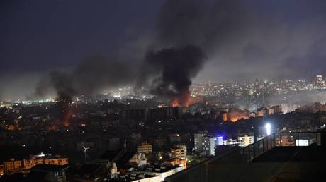 FILE PHOTO: Black smokes and flames rise over Beirut  after the Israeli army carried out airstrikes in the south of the capital Beirut, Lebanon on October 3, 2024.