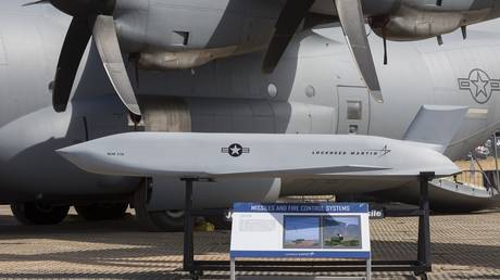 FILE PHOTO: The AGM-158 JASSM cruise missile on display next to a C-130 Hercules.