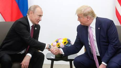 Donald Trump (R) meets Vladimir Putin on the first day of the G20 summit in Osaka, Japan, June 28, 2019