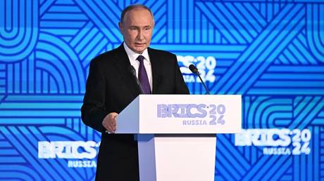 Russian President Vladimir Putin speaks during a plenary session of the BRICS Business Forum in Moscow.