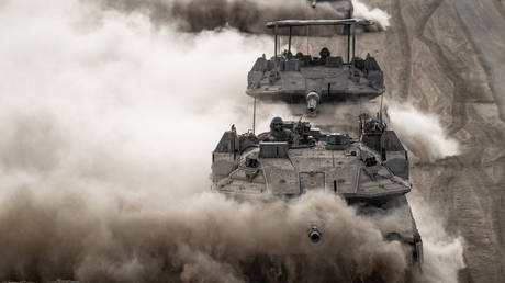 FILE PHOTO. Military mobility of tanks, armored personnel carriers, trucks and military jeeps belonging to the Israeli army continues on the northern border of Gaza.