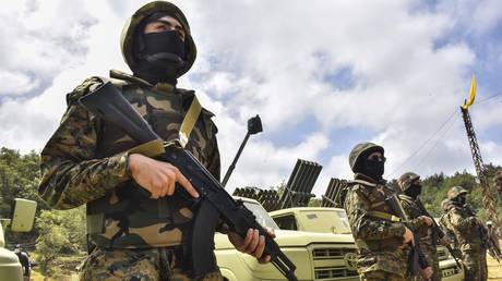 FILE PHOTO. Lebanese Hezbollah fighters.