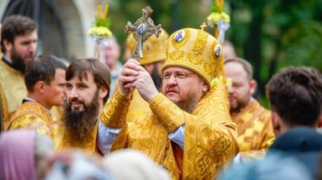 Orthodox leader sustains burns and concussion during raid on Ukrainian cathedral