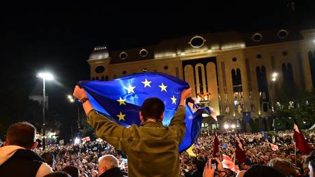 Supporters of Georgiaâ€™s pro-Western and pro-EU opposition parties gather outside the parliament in Tbilisi, October 28, 2024.