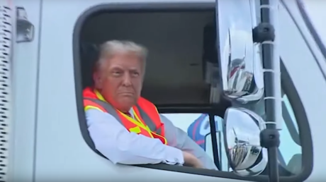 Trump Takes a Ride in a Garbage Truck