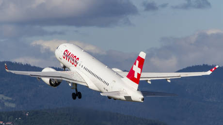 Swiss Airbus A220 takes off - stock photo